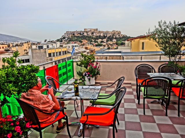 Attalos Hotel rooftop garden-cafe-bar with a view of the Acropolis